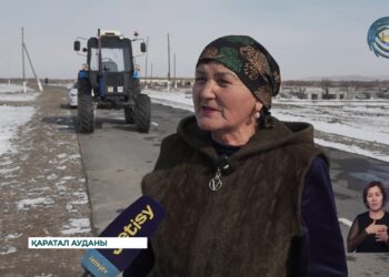 Жетпіс жасқа таяған ана трактор тізгіндеп жүр